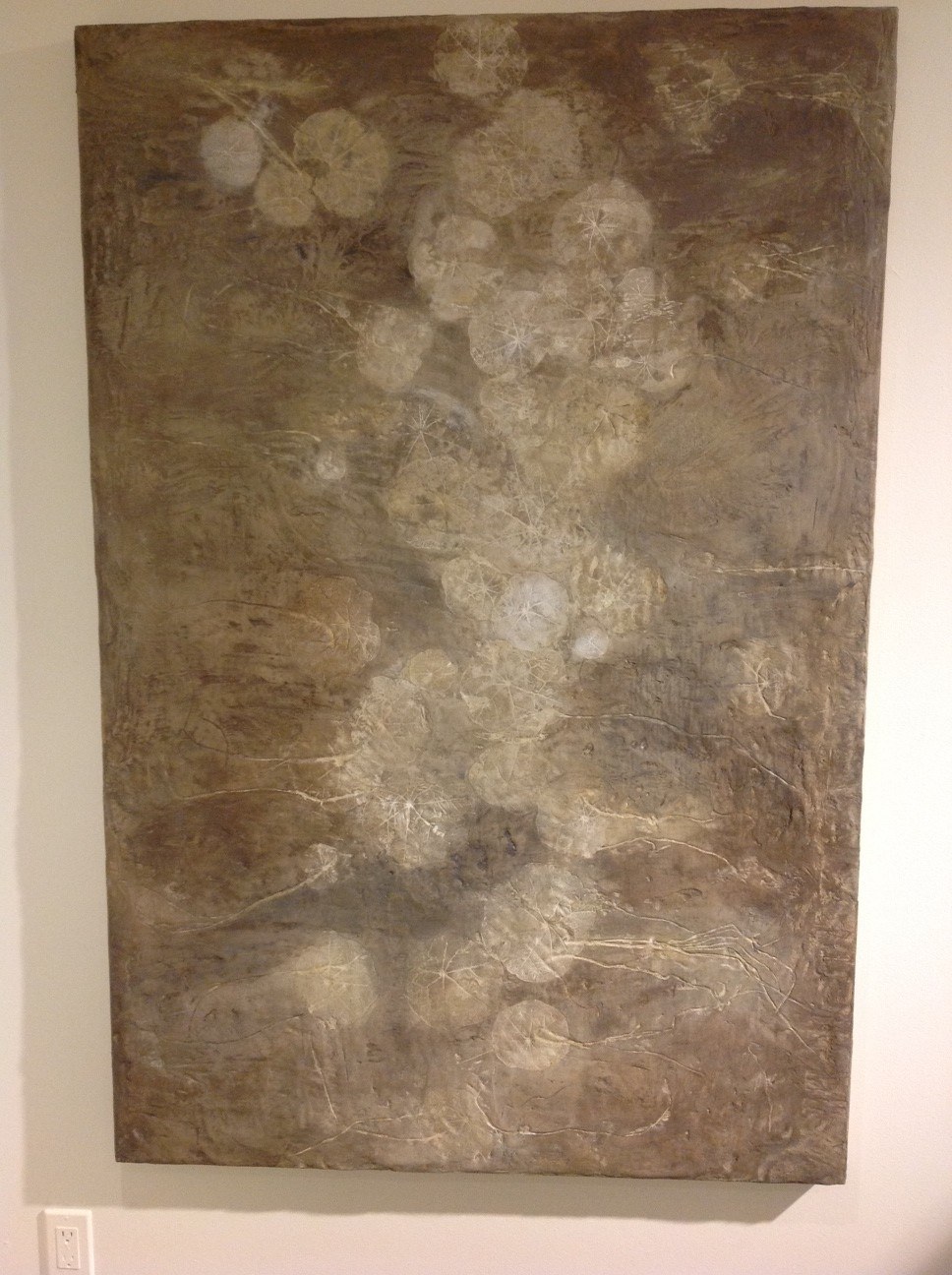 concrete wall panel with nasturtium leaf impressions