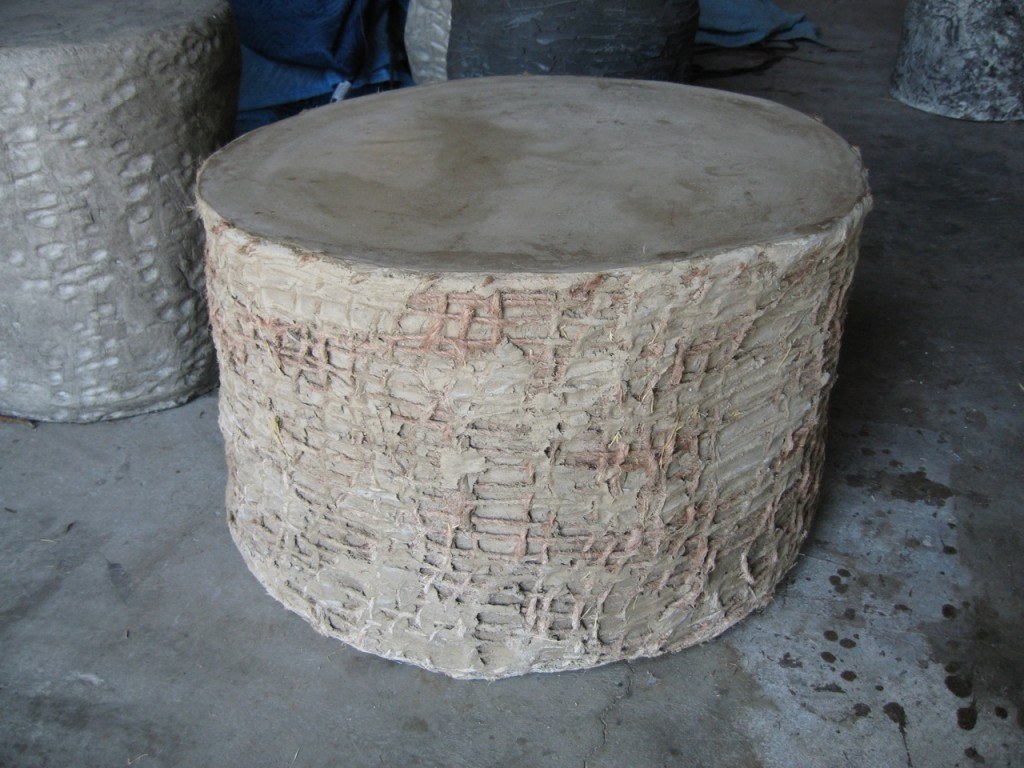 Concrete Cylindrical Coffee Table with organic shape and jute embedded