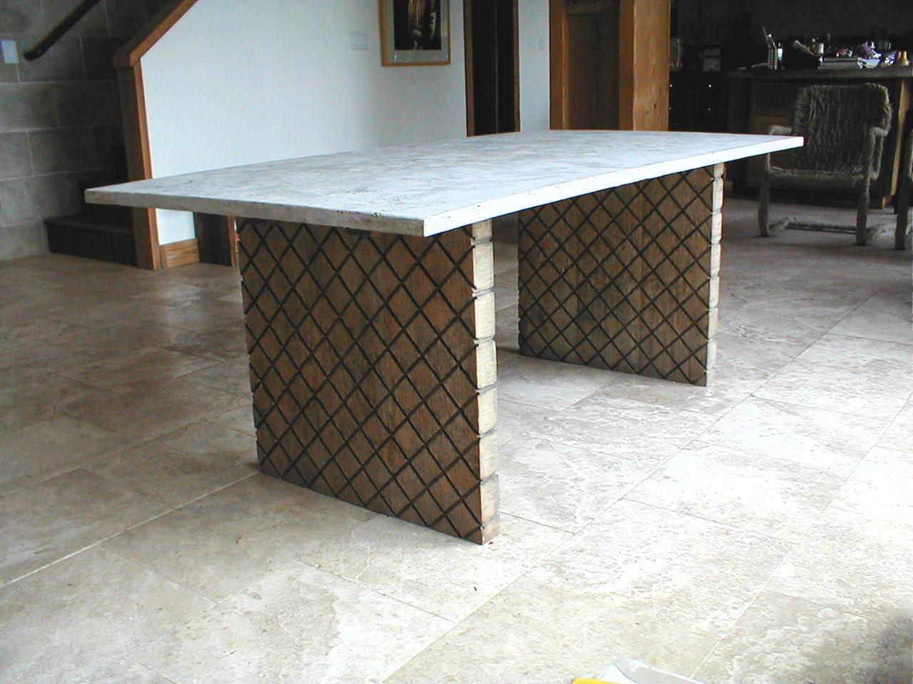 concrete dining table with cross-hatched wood base