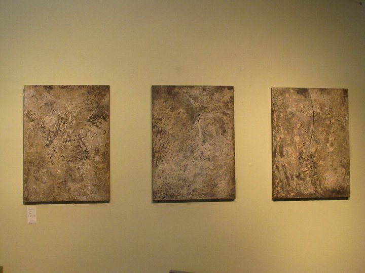 triptych of 20" x 30" brown botanical concrete panels