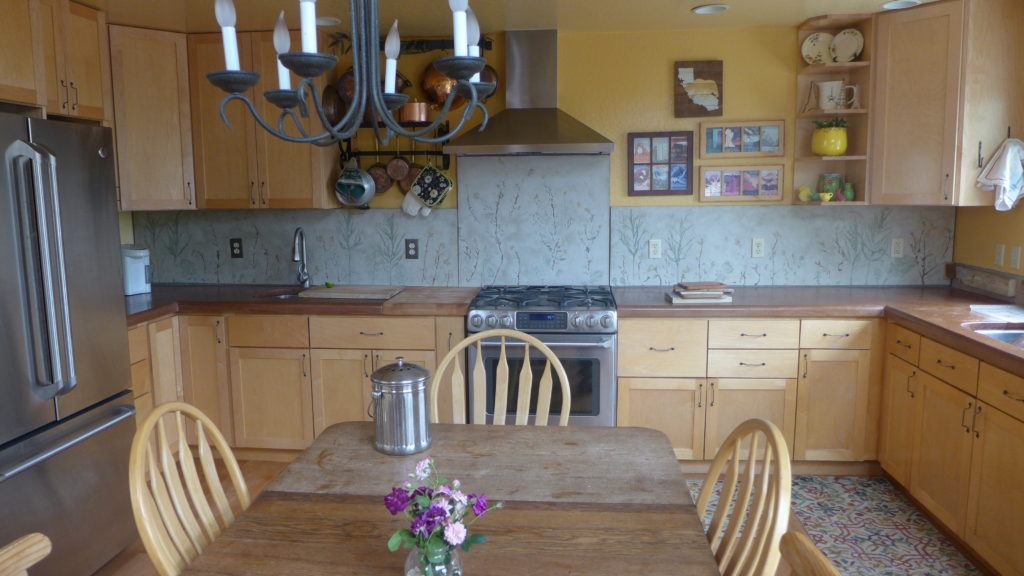 Concrete backsplash with Leafy design in kitchen