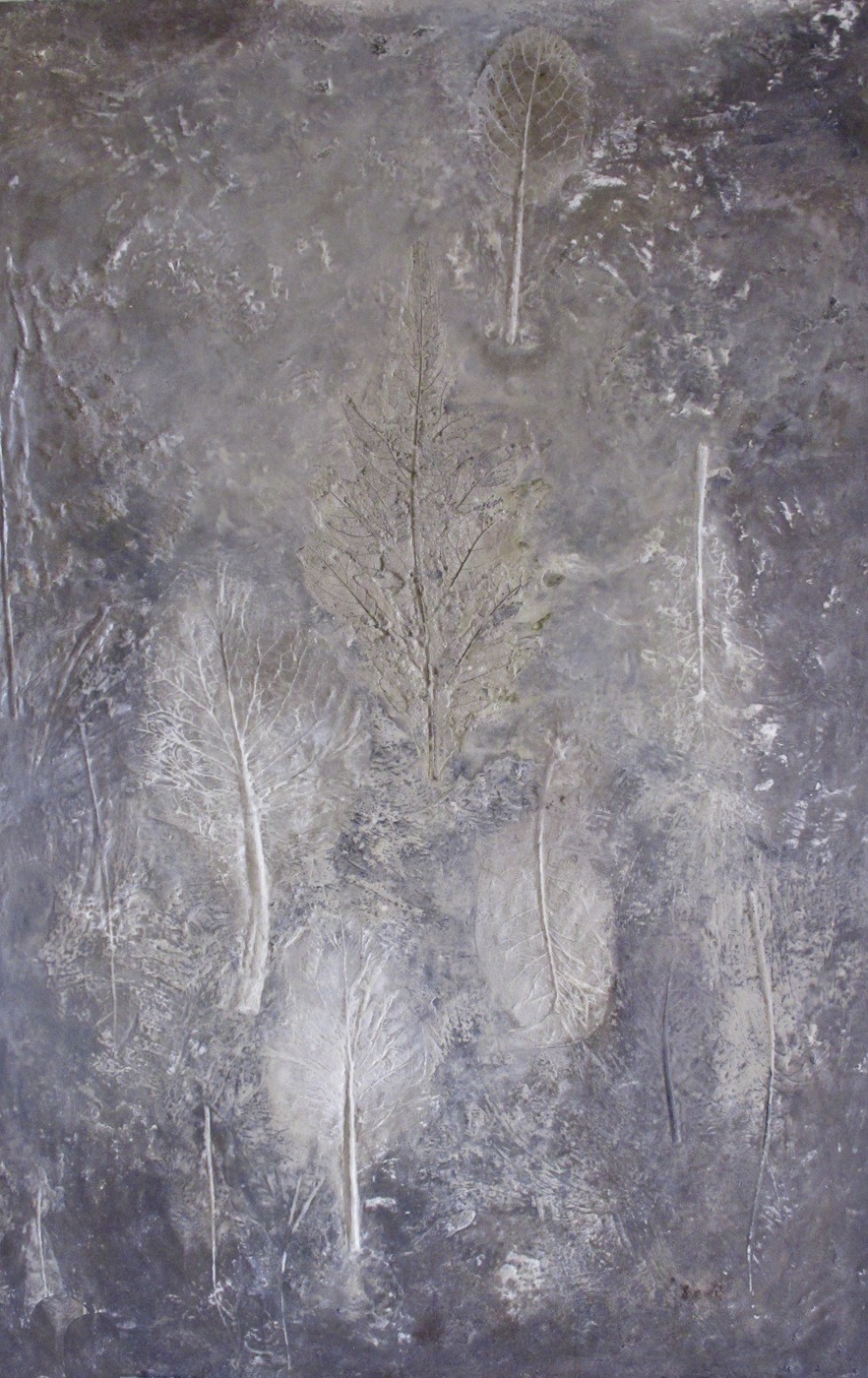 closeup of concrete botanical impressions in wall panel