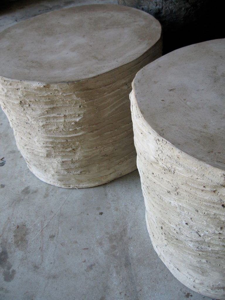 Rustic and organic Concrete coffee Tables with rough horizontal line pattern on sides