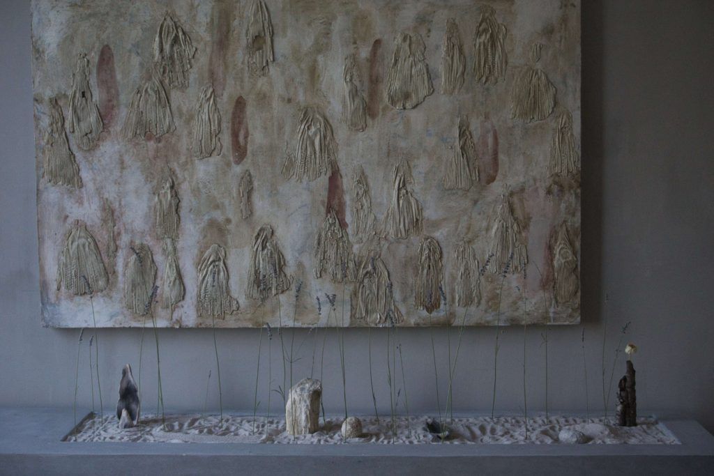 sandplay table with lavender and clay sculptures