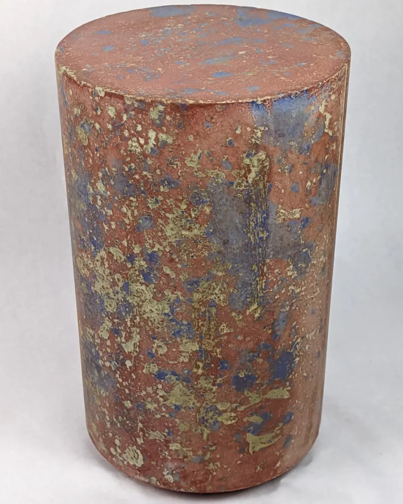 red and blue concrete side table 12" x 20" tall, Pollock-like pattern