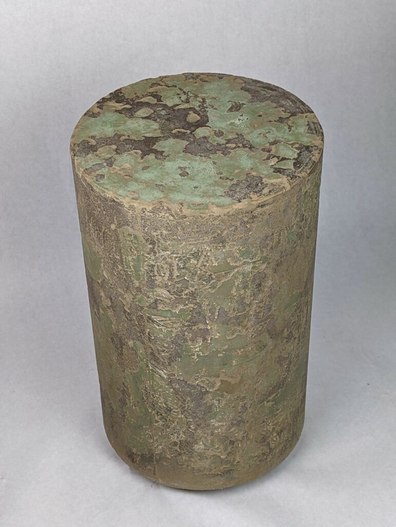 Artistic, Natural Concrete Accent table with greens, browns, and textured pattern on the side, reminiscent of a coastal prairie