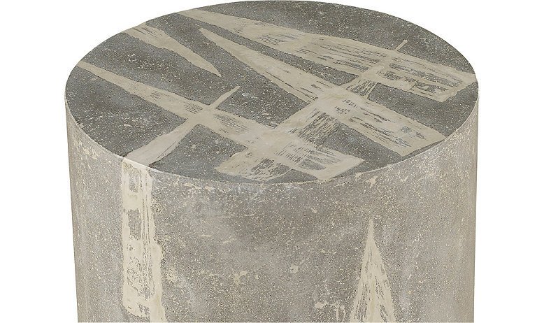 Detail shot of grey small 12" x 20" circular side table with corn husk imprints on top in sides in yellowish beige 