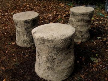 Triple group of Handmade Cylindrical Concrete Side Table with embedded seeds