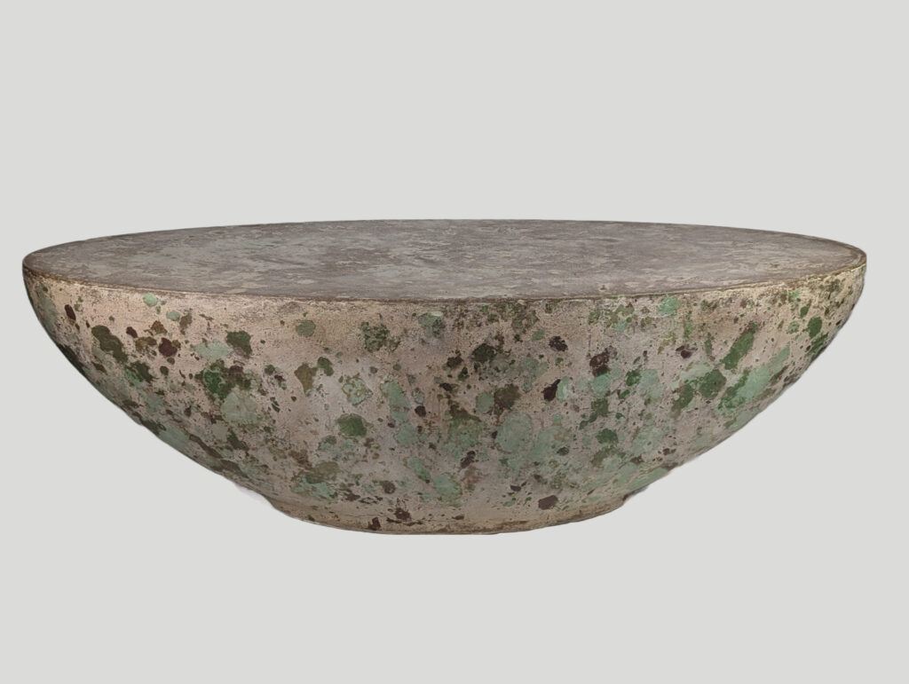 Concrete oval coffee table with mottled greens and browns o