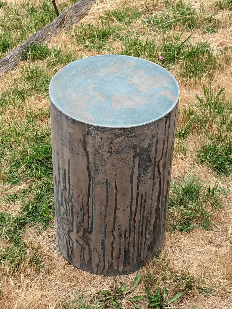 Round Concrete Side Table with Green and Brown marbled top and green drips on sides